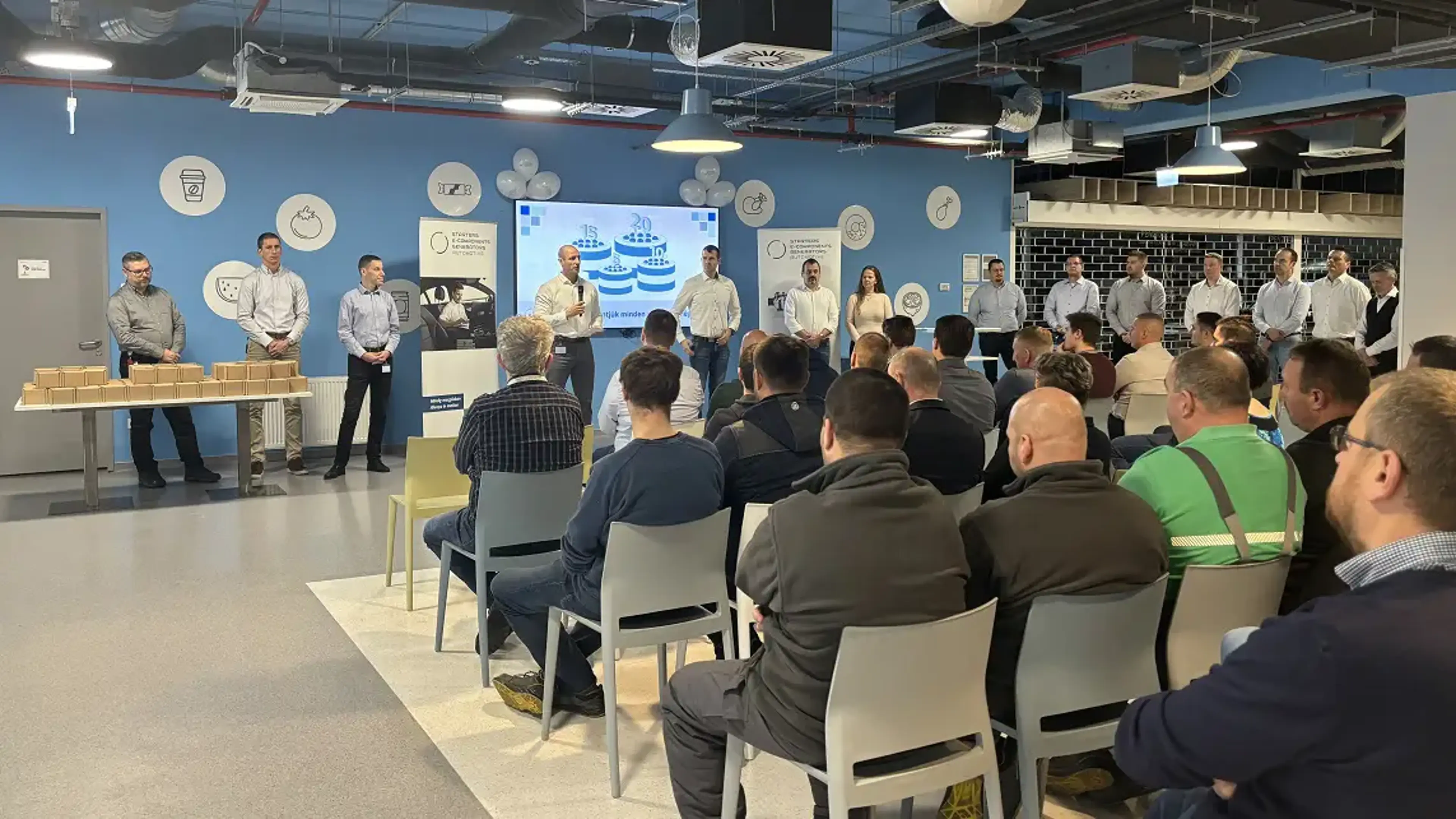 Colleagues at an anniversary event